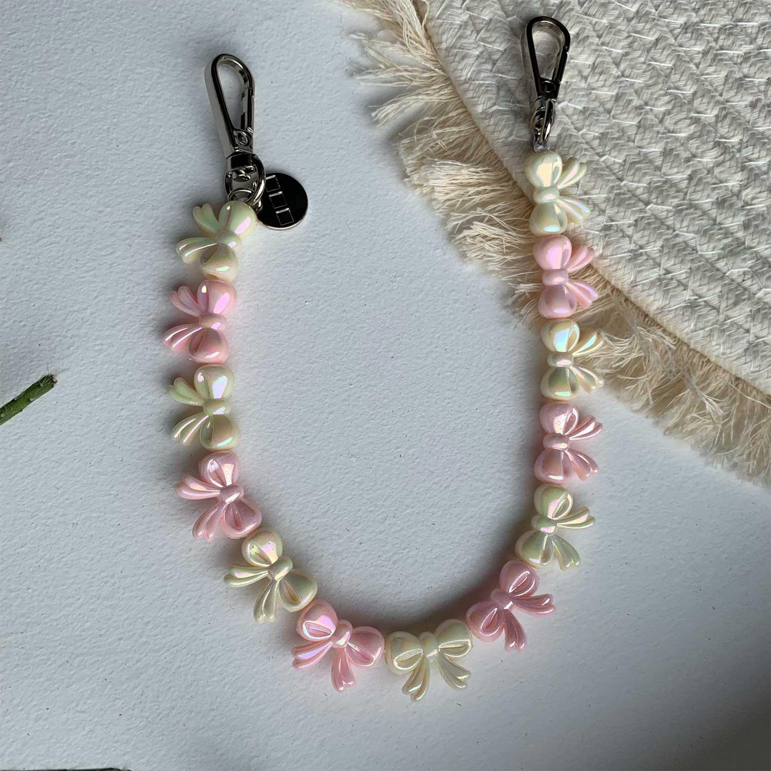 Cordon de téléphone Bow - rose clair blanc - argent