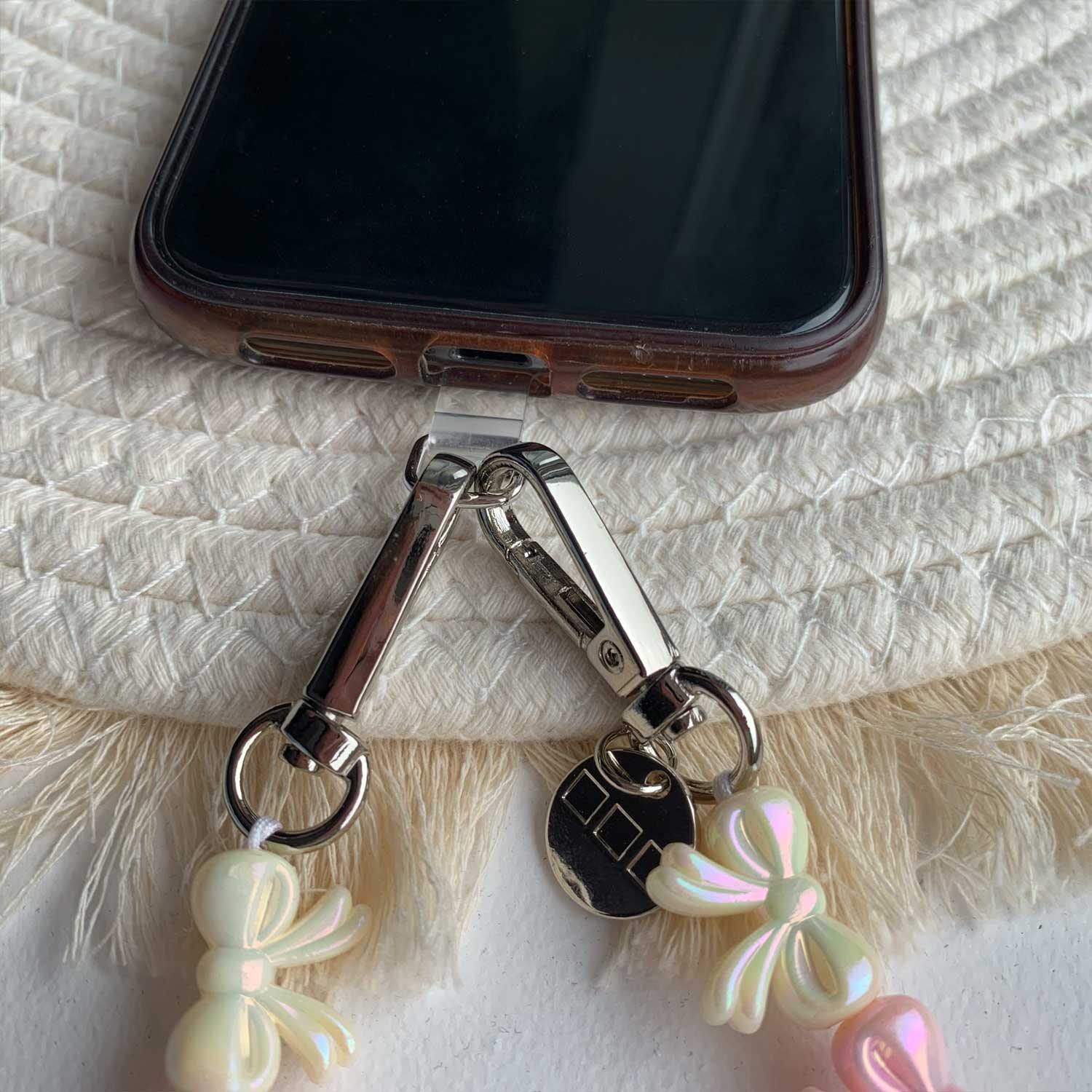 Cordon de téléphone Bow - rose clair blanc - argent