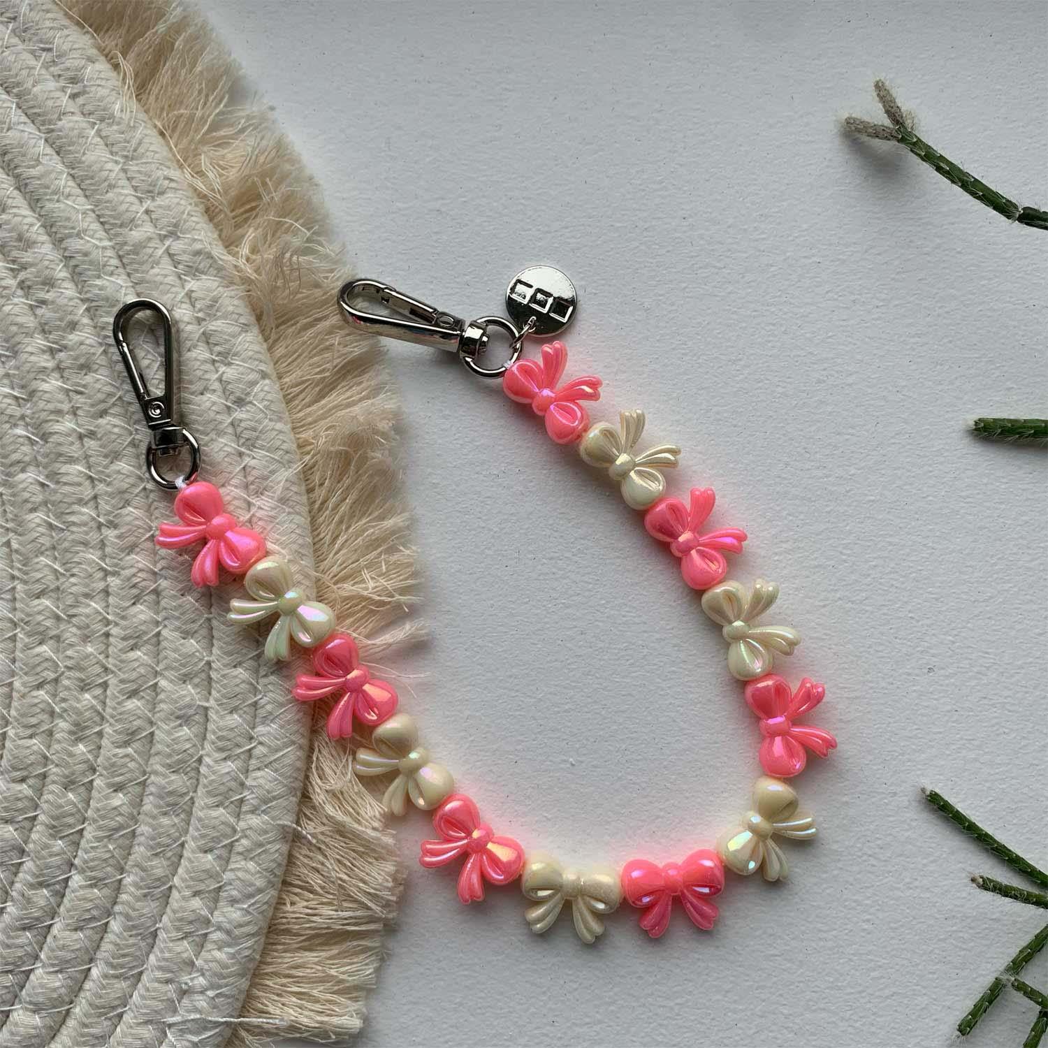 Telefoonkoord Bow - roze wit - zilver